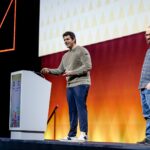 Carlo Fisicaro and Fabio Airoldi on stage for KubeCon 2025